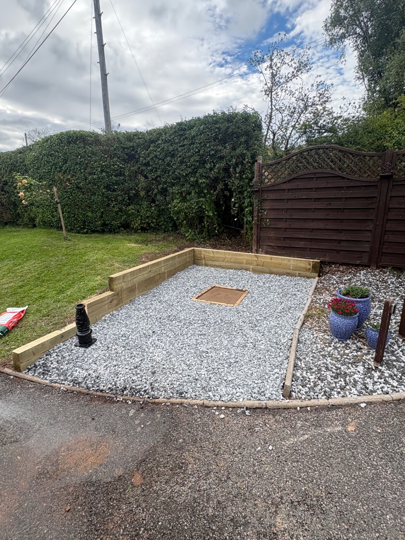 New gravel area with timber sleeper edging